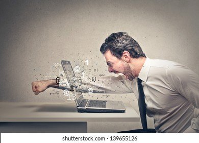 furious-businessman-throws-punch-into-260nw-139655126.jpg