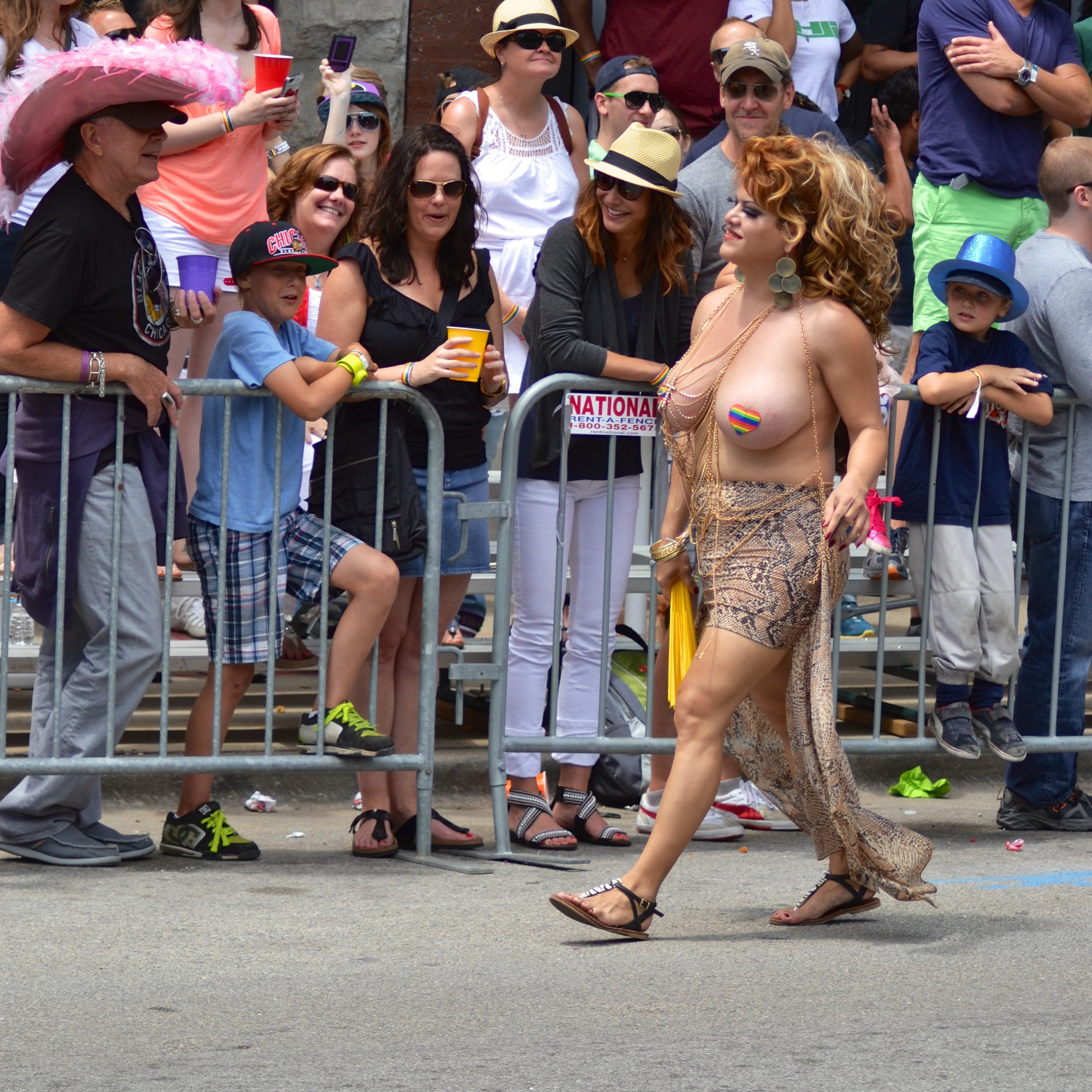Topless_woman_at_Chicago_Pride.jpg