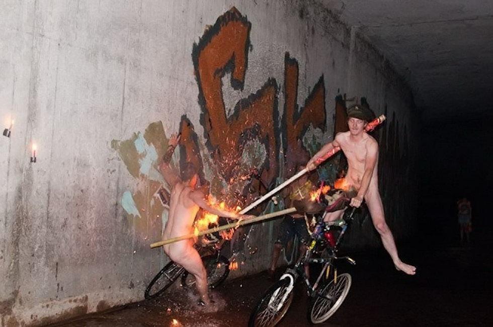 underground naked flaming bicycle jousting.jpg