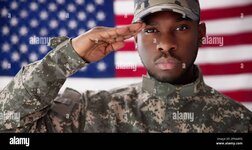 rear-view-of-military-man-saluting-us-flag-2PXAAFG.jpg