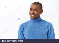 ouch-that-hurts-portrait-of-embarrassed-and-awkward-young-man-cringe-grimacing-and-looking-pit...jpg